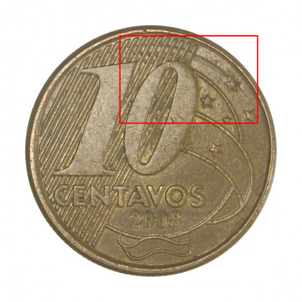 Exemplo Moeda de 10 centavos com rastro nas estrelas 